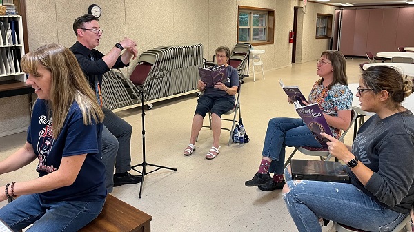 Choir members practicing